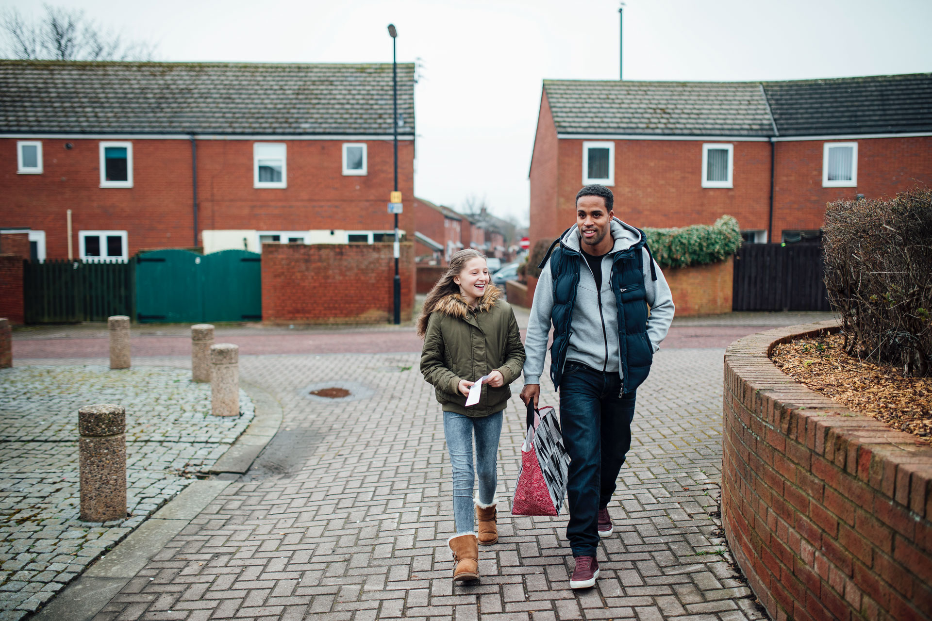 Man and a child walking